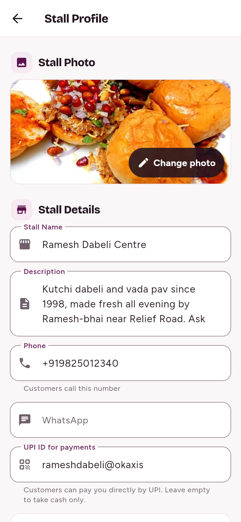 Stall profile with a stall photo, stall name, description, phone number, WhatsApp and the UPI ID for payments